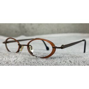 Theo Belgium Eyeglasses Spectacles Mod. Barrel Knot 115 Slim Oval Orange Metal